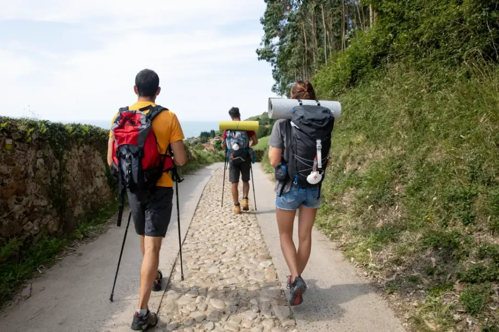 people traveling together with their backpacks